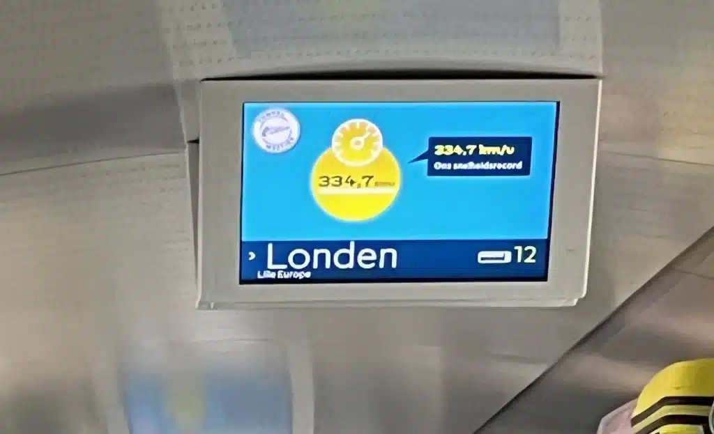 overhead screen on Eurostar showcasing the high speed record