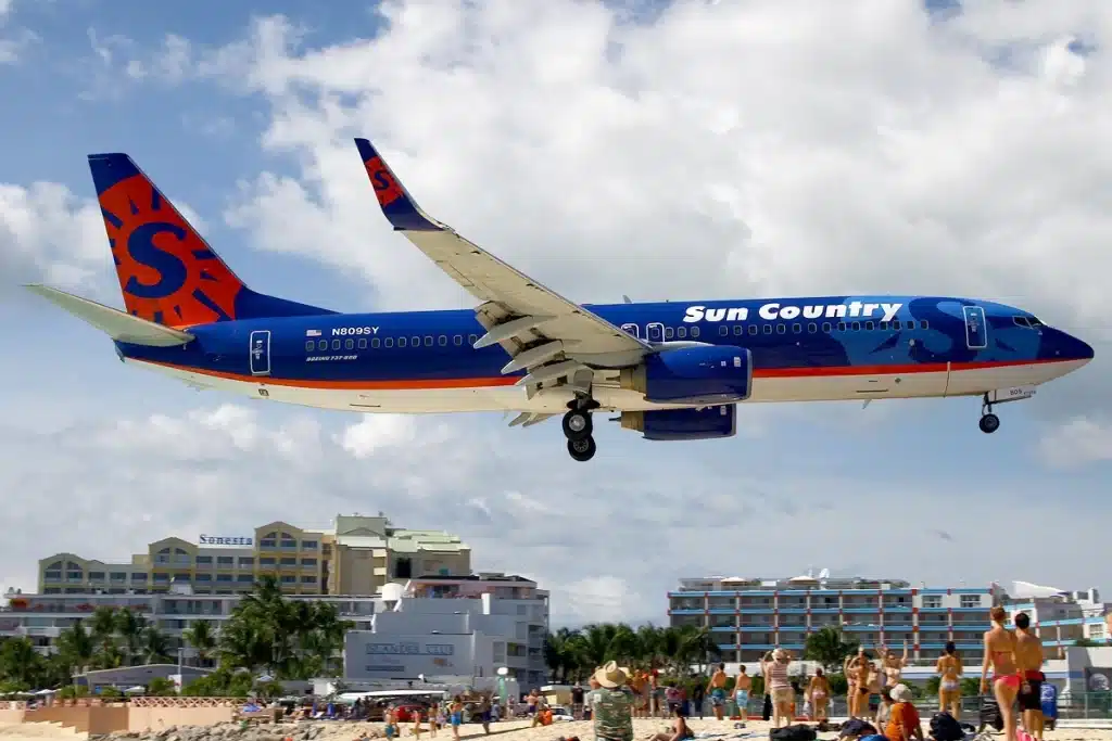 St Maarten is home to a unique airport approach that forces planes to fly only a few feet above beachgoers.