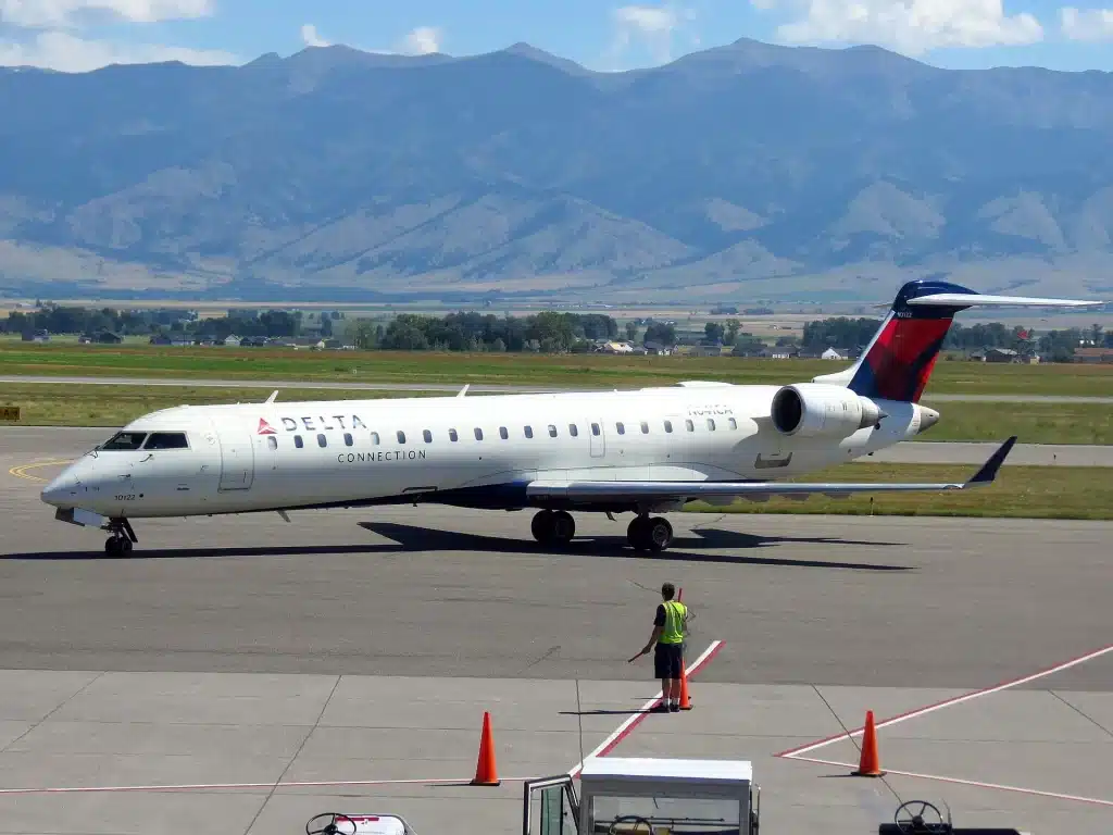 Delta Connection Embraer 145 parked at Bozeman Yellowstone International Airport.