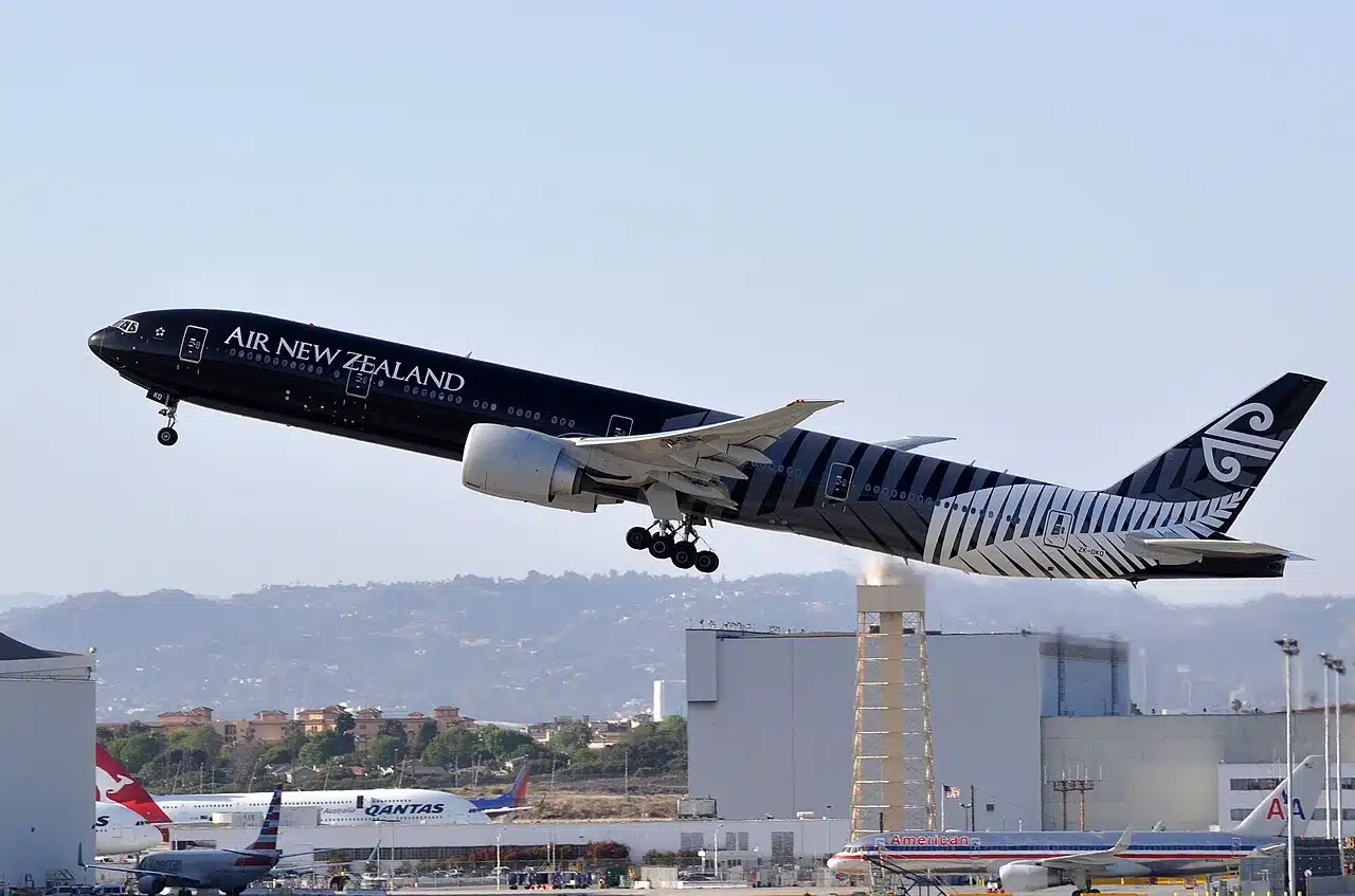 Air New Zealand Boeing 777 taking off in it's All Blacks rugby team livery.