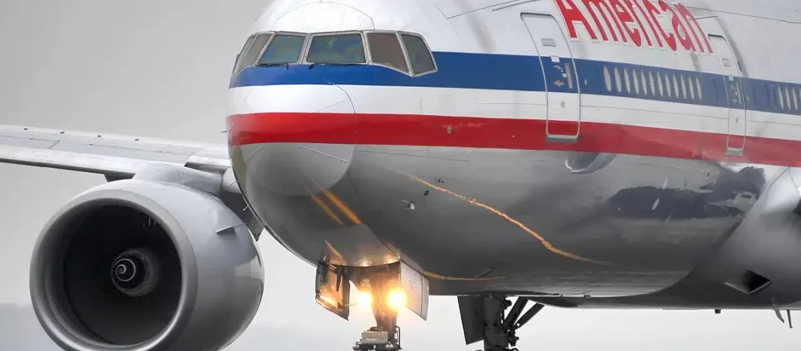 American Airlines Boeing 777 in it's bare aluminum livery.