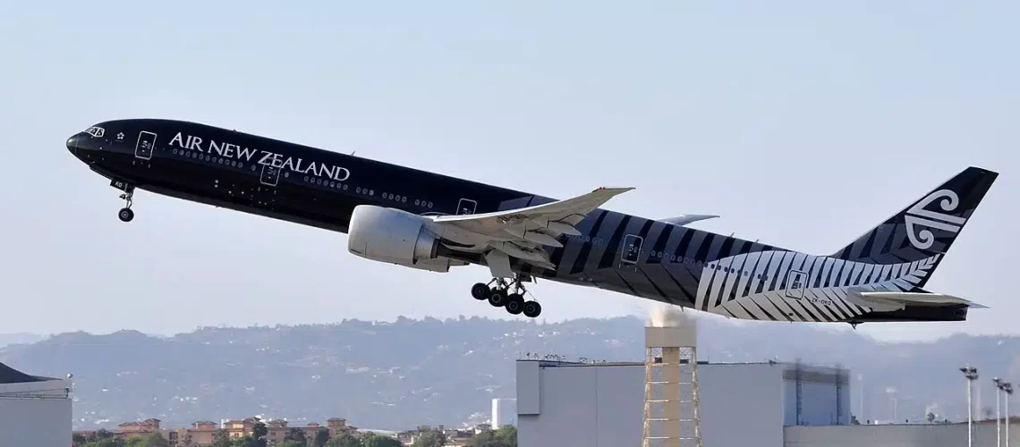 Air New Zealand Boeing 777 taking off in it's All Blacks rugby team livery.