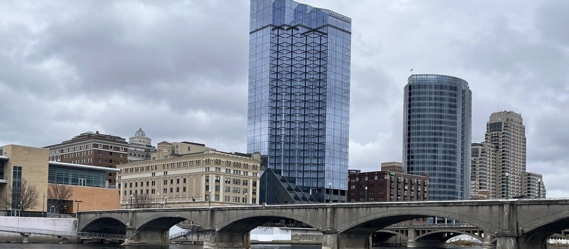 view of downtown grand rapids across the river from the gerald ford museum.