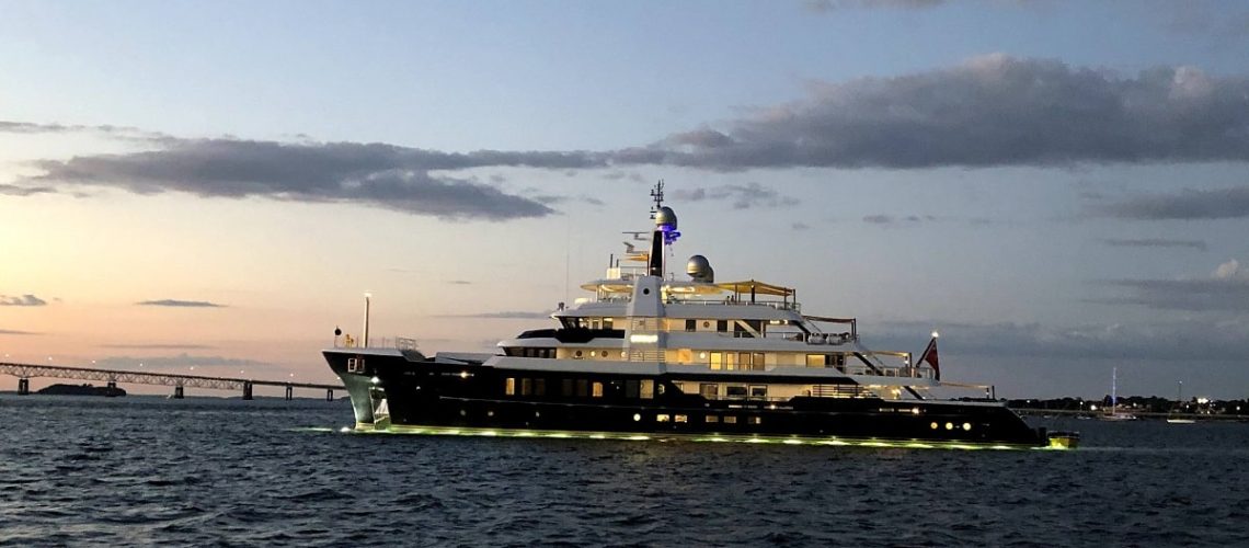 yacht departing from Newport harbor as seen from the madeleine sailing tour